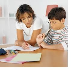 Parent helping child with homework